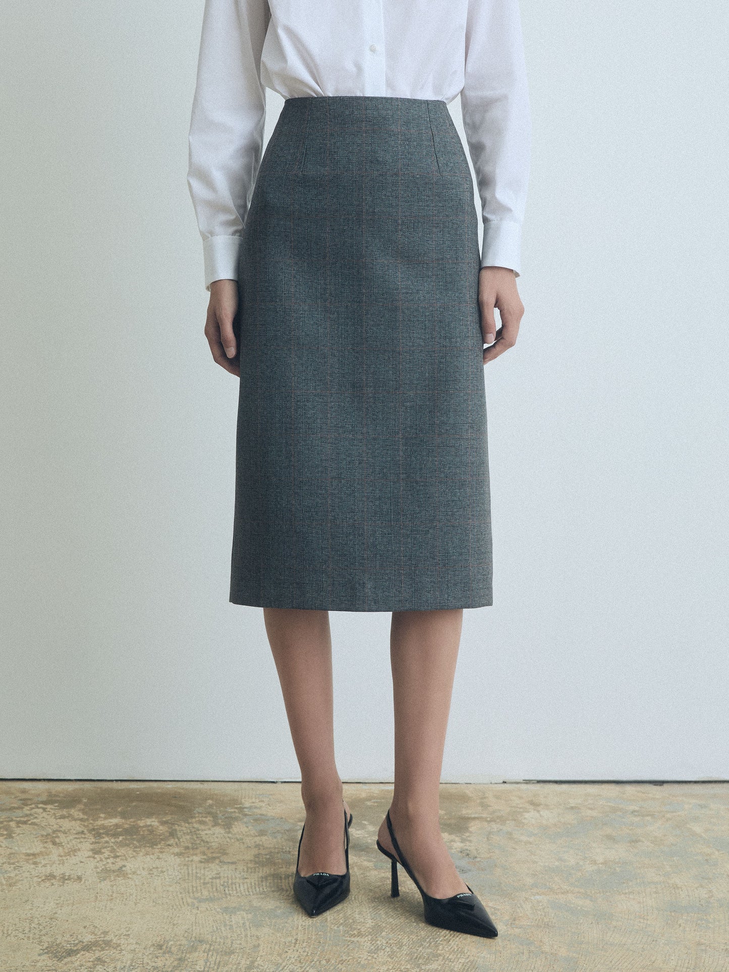 Grey Prince of Wales wool pencil skirt by Judith & Charles.