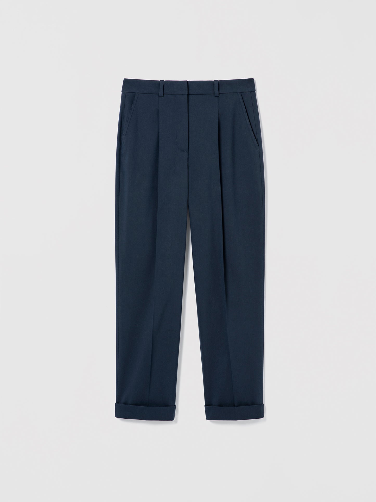 Flat‑lay of Navy pleated cuffed trousers with slash pockets, welt pockets, and a clean tailored waistband.