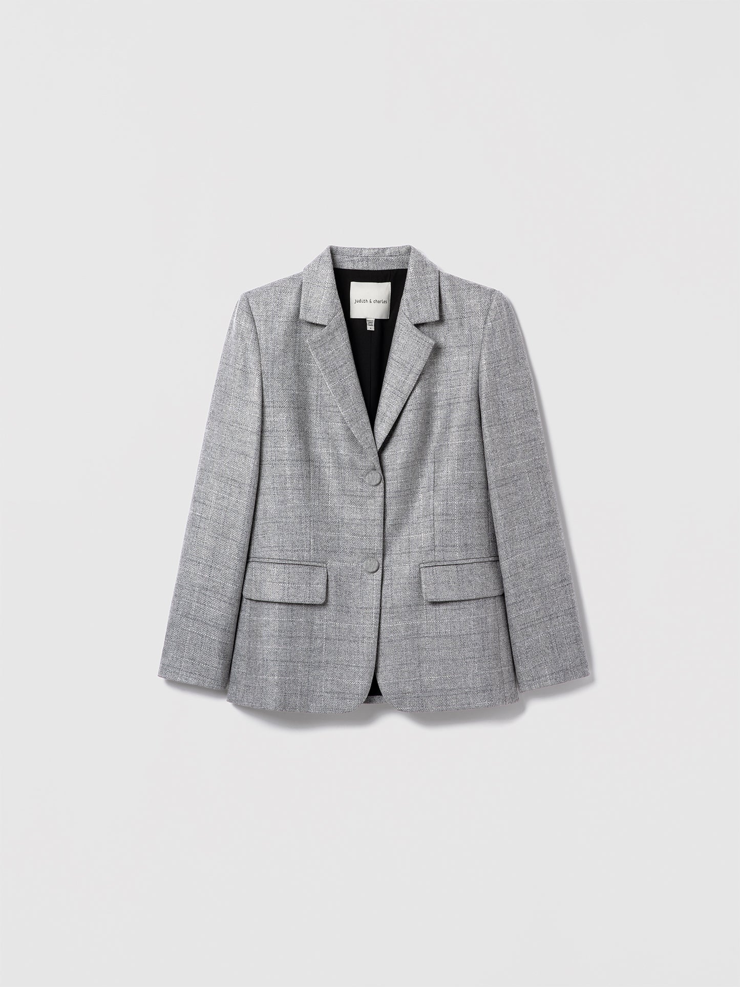 Judith & Charles gray checkered blazer on a light gray background