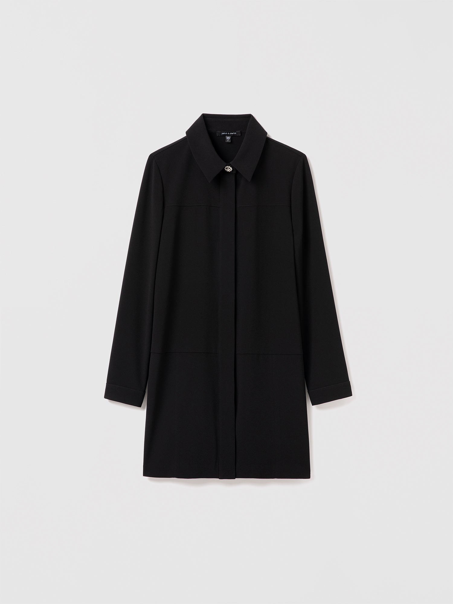 Black Edina B mini dress by Judith and Charles, long sleeve straight style in satin back crepe with shirt collar and jewel buttons. Made in Canada with Japanese fabric.