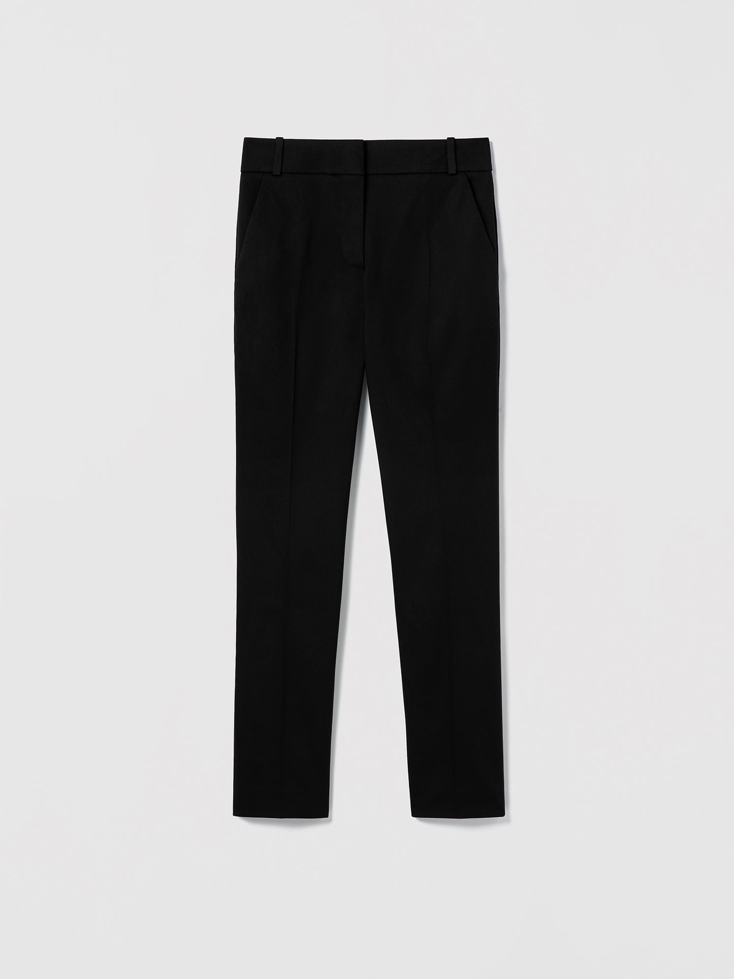 Black pants on a light gray background