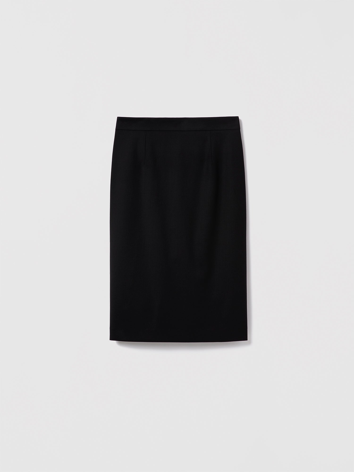 Black fitted pencil skirt by Judith & Charles in stretch suiting fabric, featuring a clean waist, invisible back zipper, back slit, and full lining.