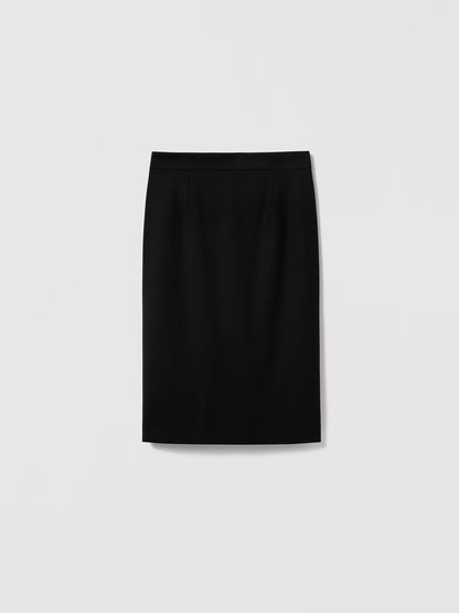 Black fitted pencil skirt by Judith & Charles in stretch suiting fabric, featuring a clean waist, invisible back zipper, back slit, and full lining.