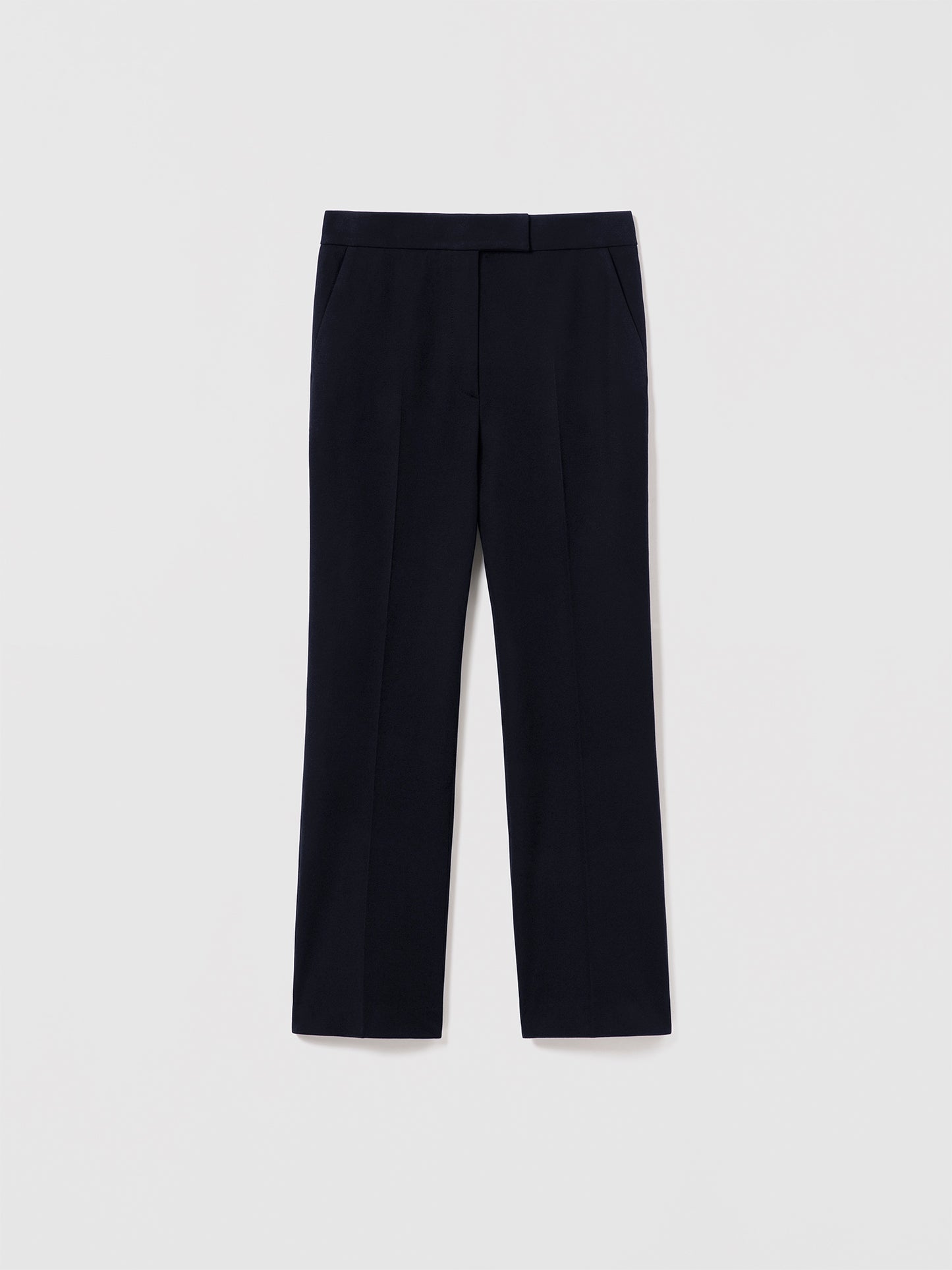 Judith & Charles Robin Pant in navy— cropped kick-flare silhouette with front zip and hook-and-eye closure, scoop front pockets, back welt pockets, and belt loops. Unlined. Made in Portugal.