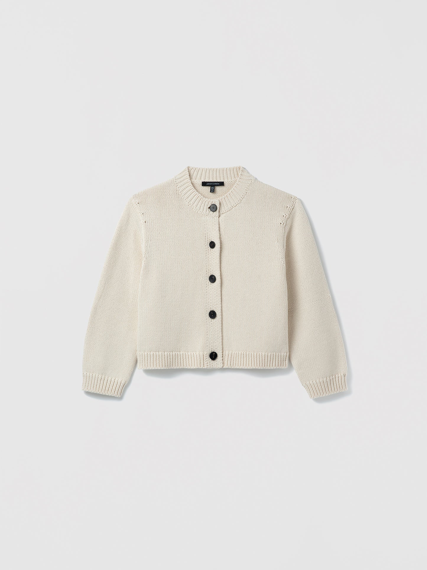 Pearl cardigan on a light gray background