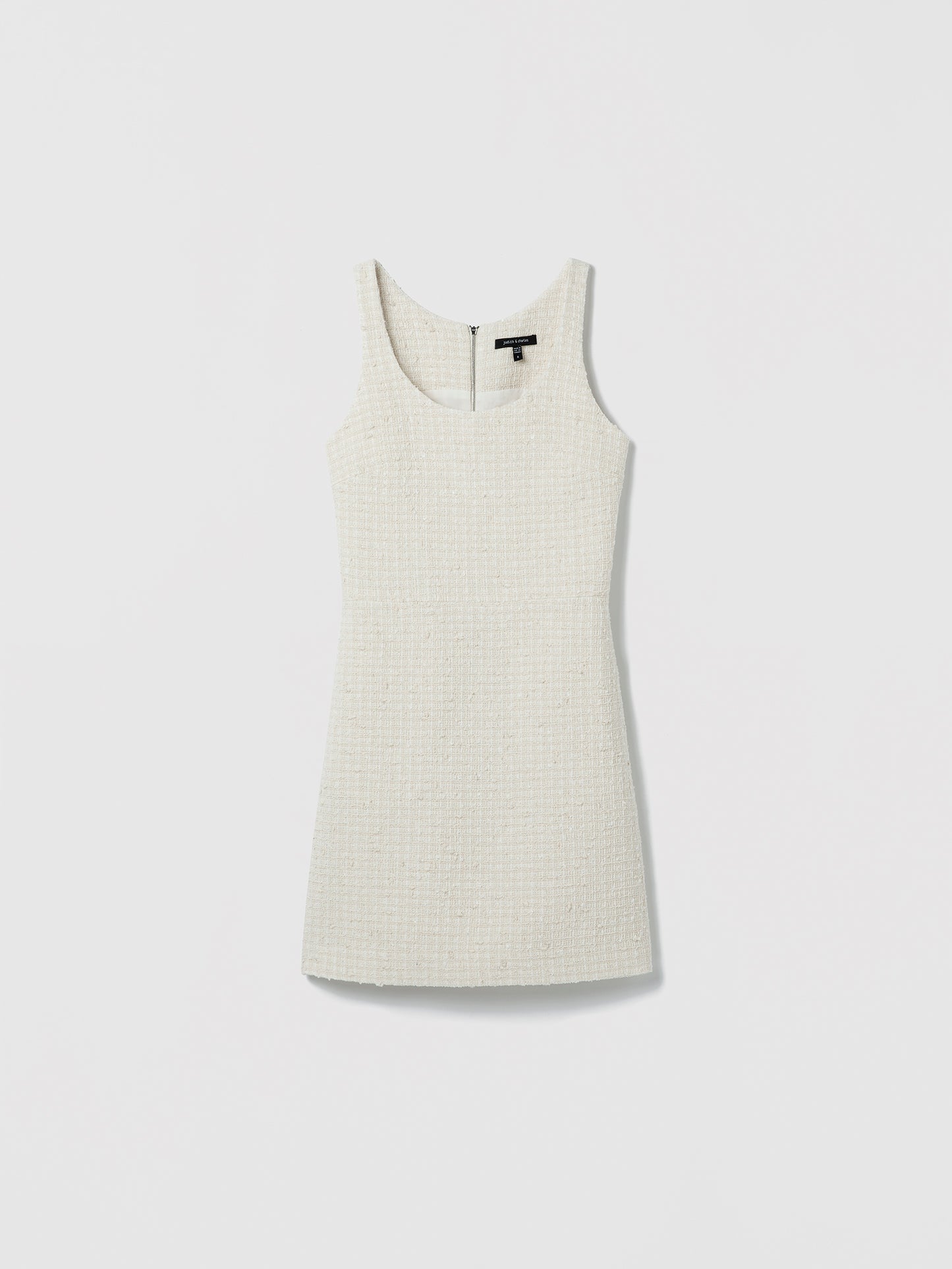 Cream sleeveless dress on a light gray background