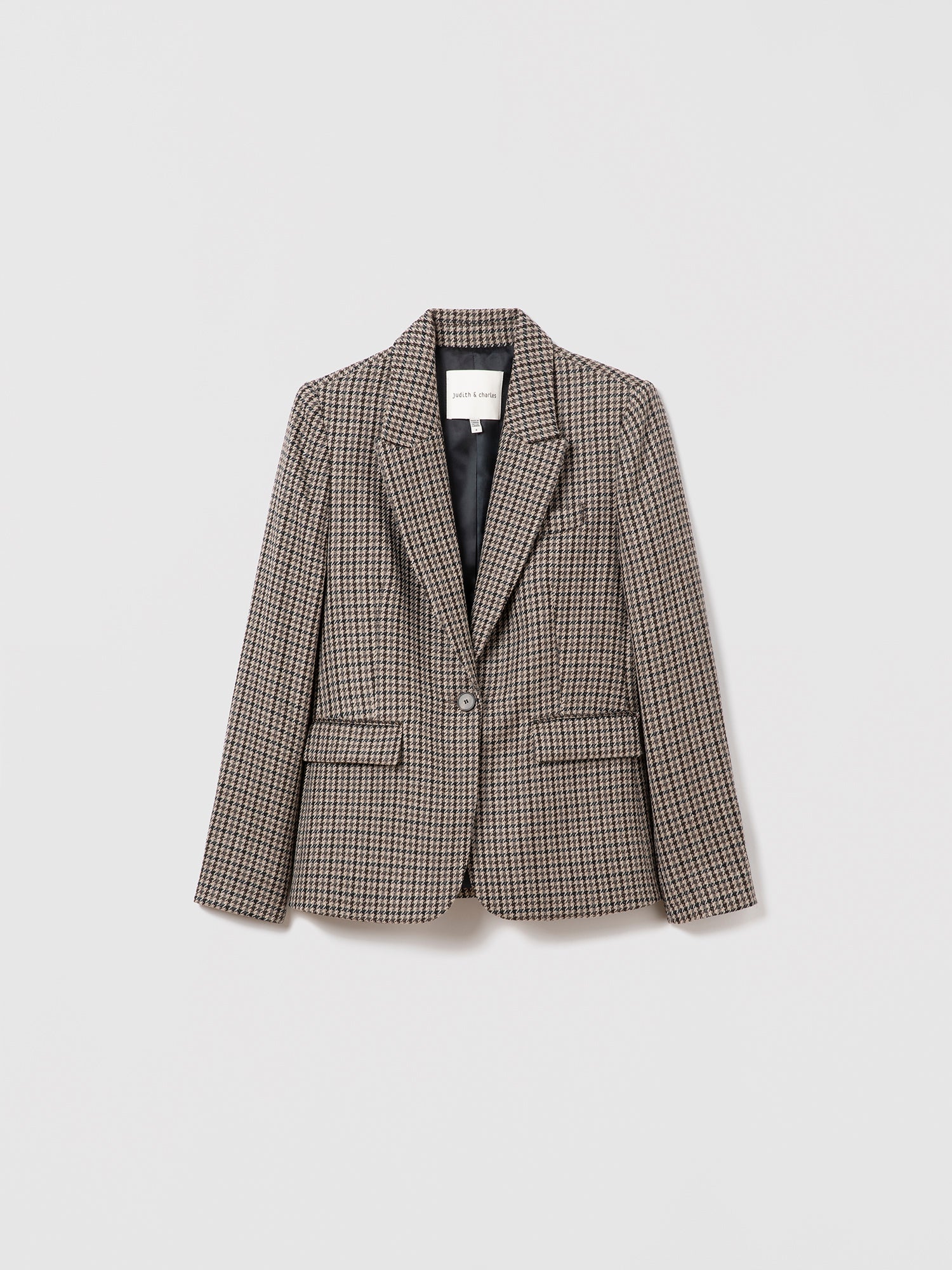 Flat lay of classic fit one-button jacket in grey taupe multi houndstooth wool-silk-linen blend with peak lapel and flap pockets