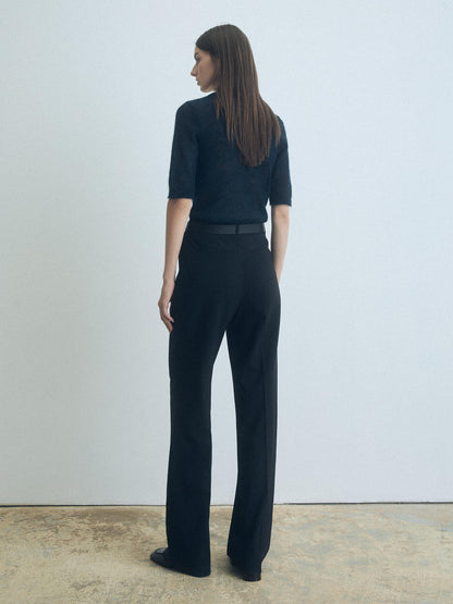 Woman wearing a Deep Ocean cropped mohair pullover with crew neck by Judith & Charles.