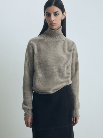 Mode wearing Taupe Corey turtleneck sweater by Judith & Charles, made from 70% wool and 30% cashmere, fisherman rib knit, style number 280-4156