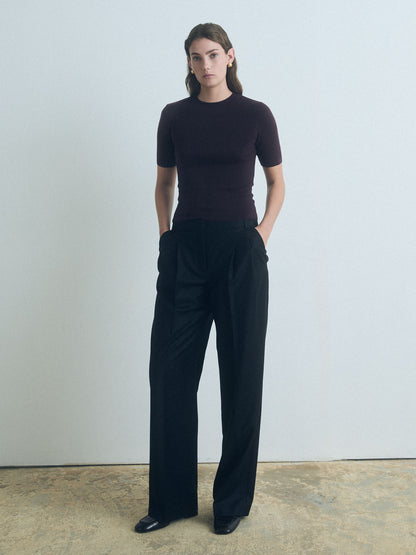 Woman wearing dark cherry Short Sleeve Sweater with crew neck by Judith & Charles. 