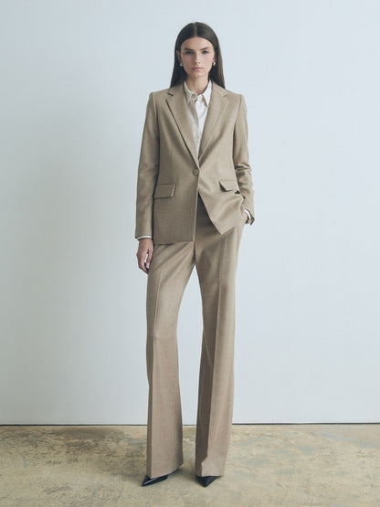 Model wearing Judith & Charles Parme straight-leg pant in camel wool-cashmere blend, unlined with 34” inseam.