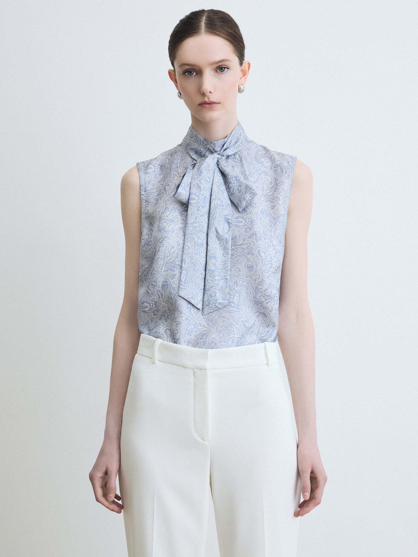 Mock Neck Sleeveless Blouse with Tie