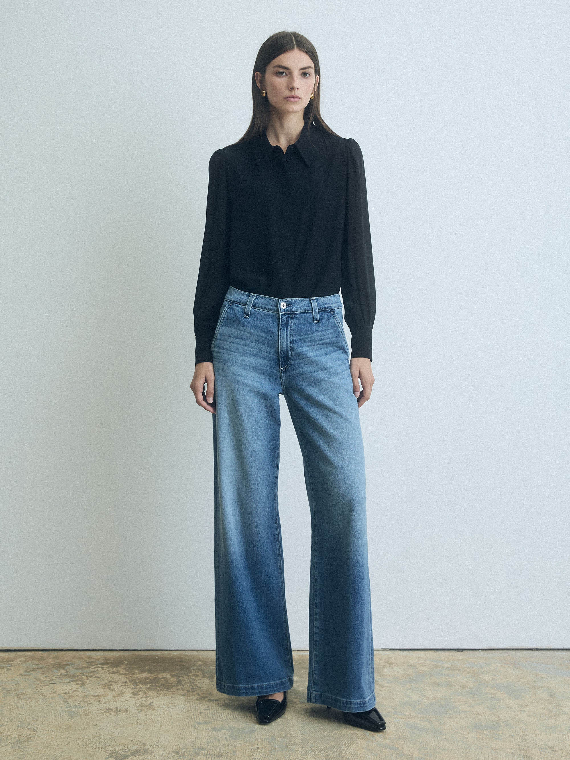 Black silk blouse from Judith & Charles with a classic collar and concealed button placket.