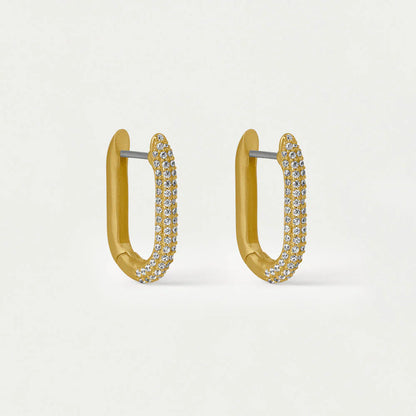 Gold hoop earrings with clear gemstones on a light gray background