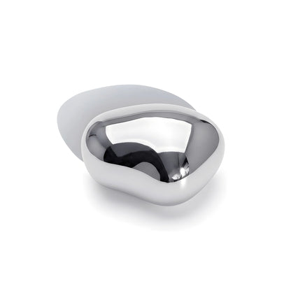 Modern silver brooch on a white background