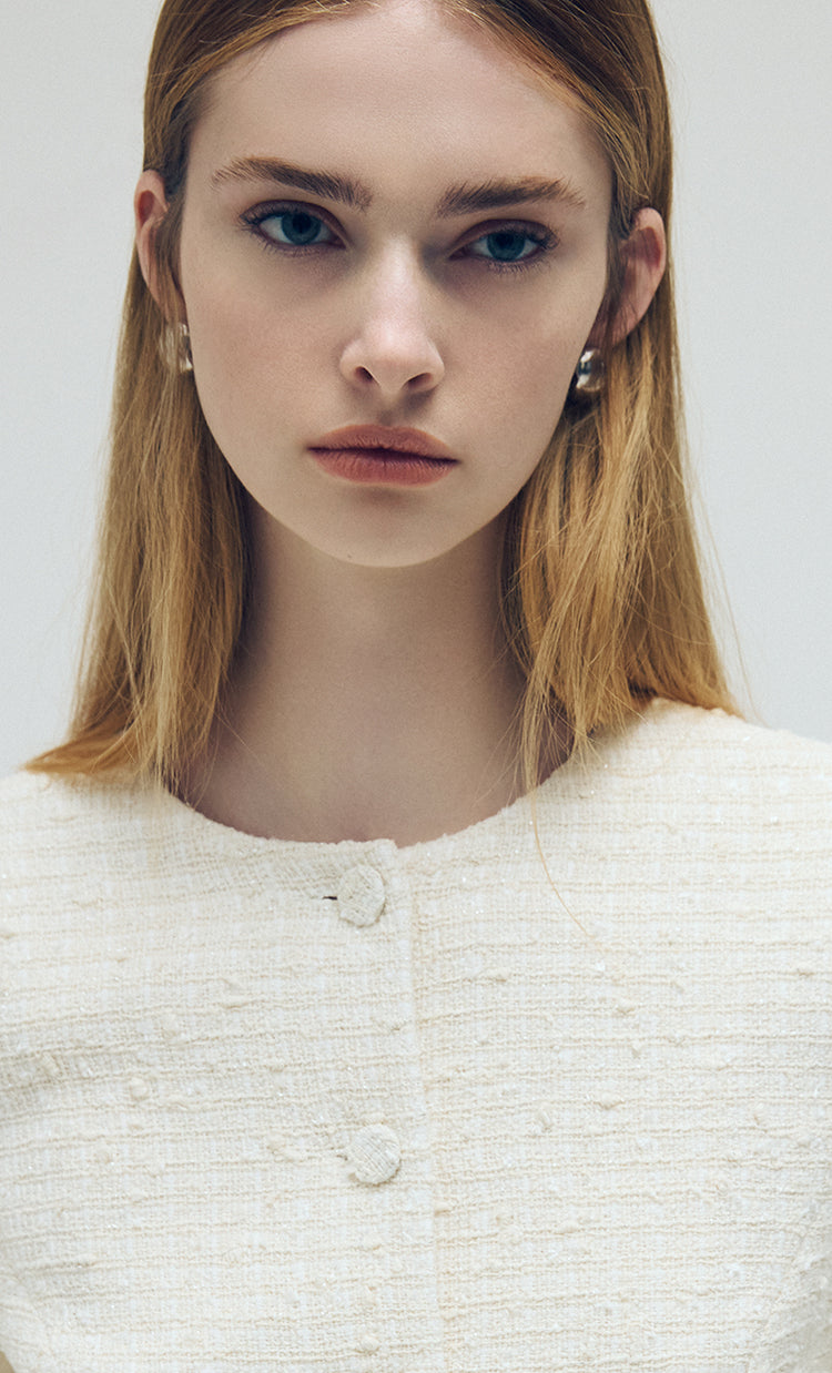 Judith & Charles Spring 2026 “In the Details” banner with light tweed jacket and new arrivals focus.