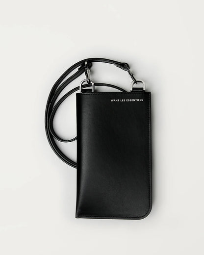 Judith & Charles — Want Les Essentiels  
Smooth leather crossbody bag with detachable strap, card slots, and clutch-like design, ideal for carrying a phone and essentials.