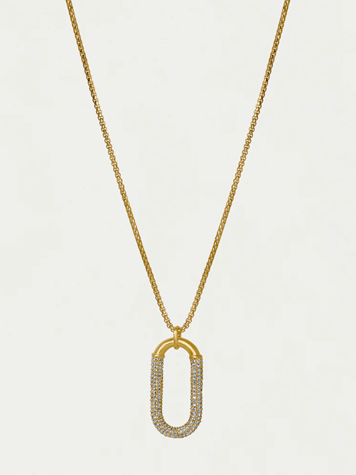 Gold necklace with an oval pendant on a light gray background