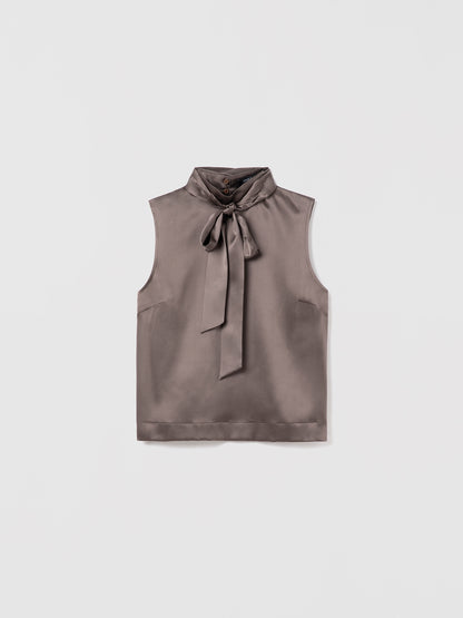 Judith and Charles taupe sleeveless Alta silk blouse with mock neck and back keyhole closure with tie, made from imported silk