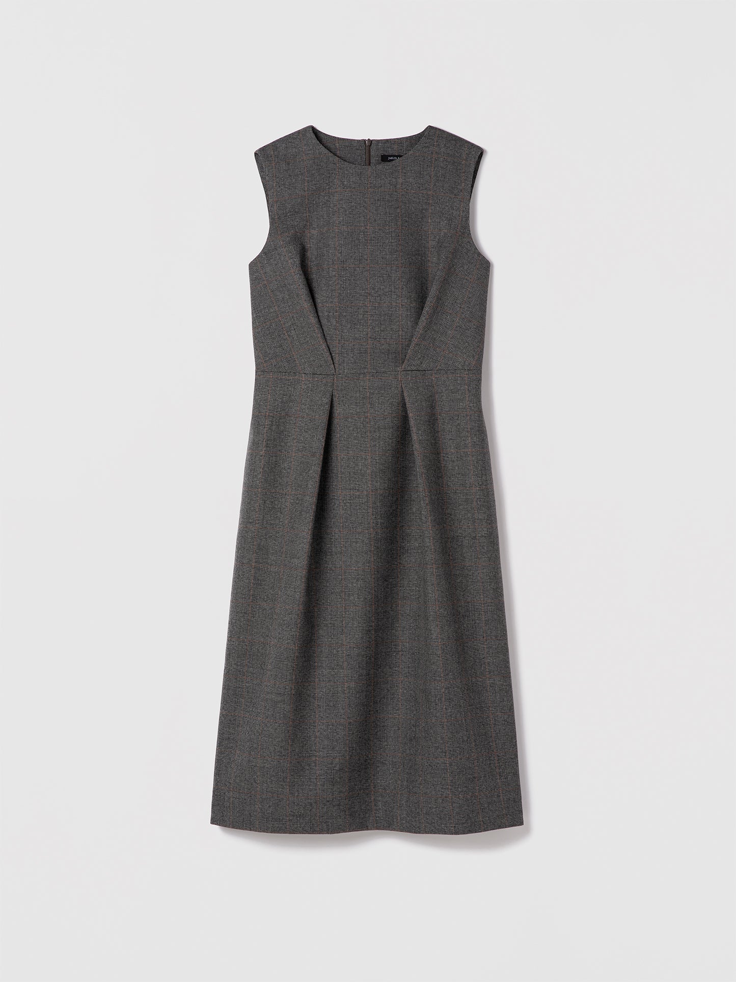 Grey sleeveless wool dress with crew neck, leather belt, and back slit — Judith & Charles.