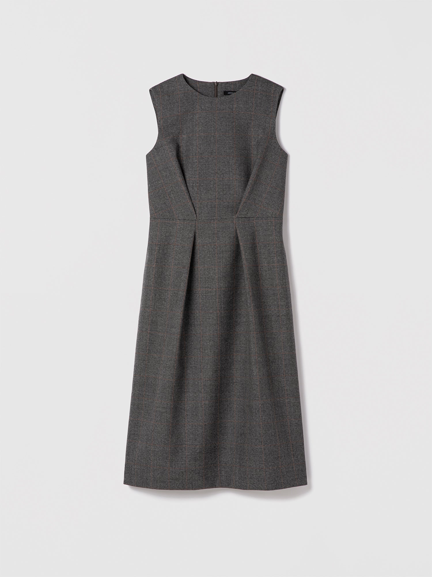Grey sleeveless wool dress with crew neck, leather belt, and back slit — Judith & Charles.