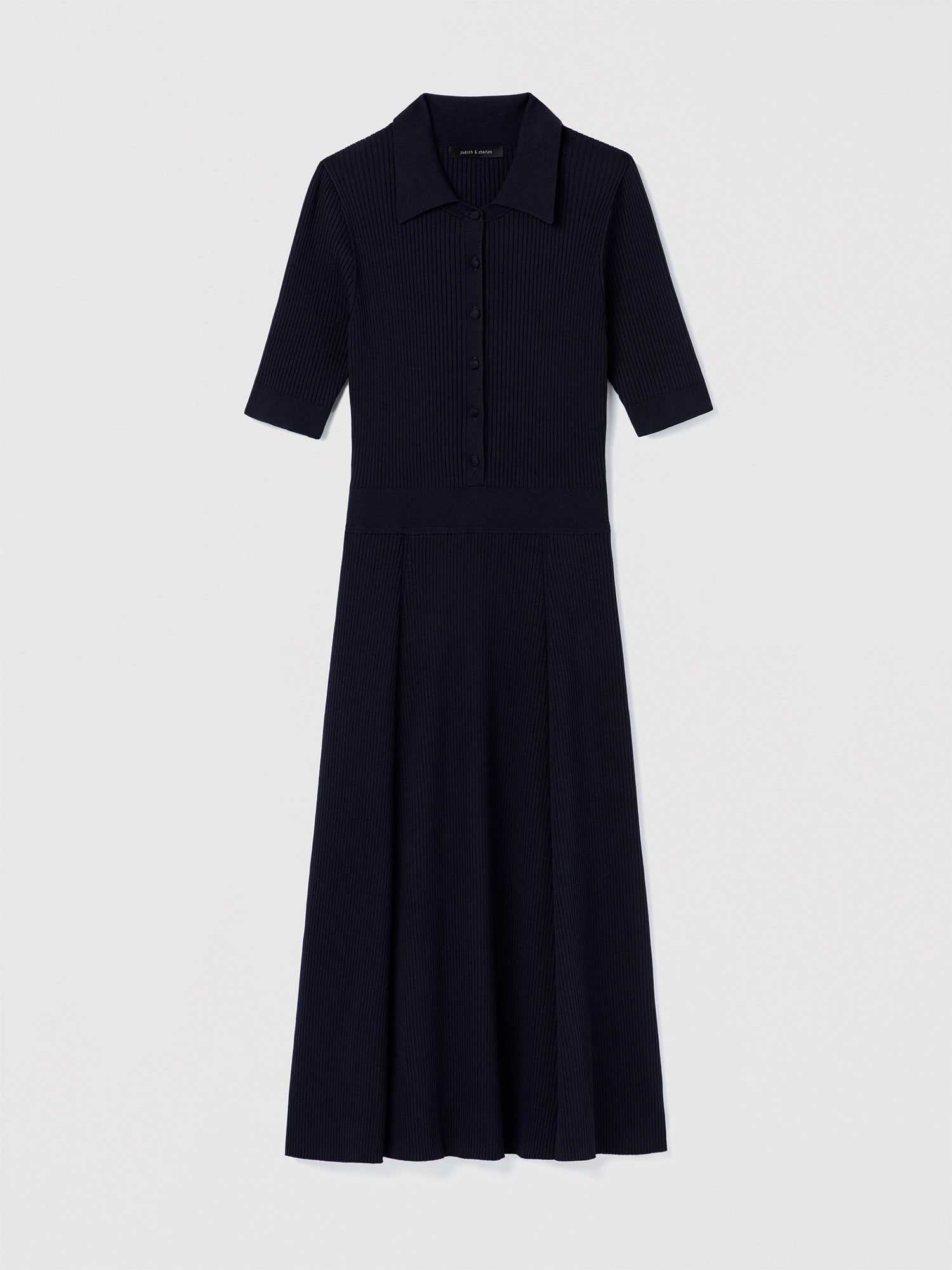 Judith and Charles Navy Bates Dress – short-sleeve ribbed polo dress with spread collar, self-covered button-front, and A-line silhouette; 45″ back length 