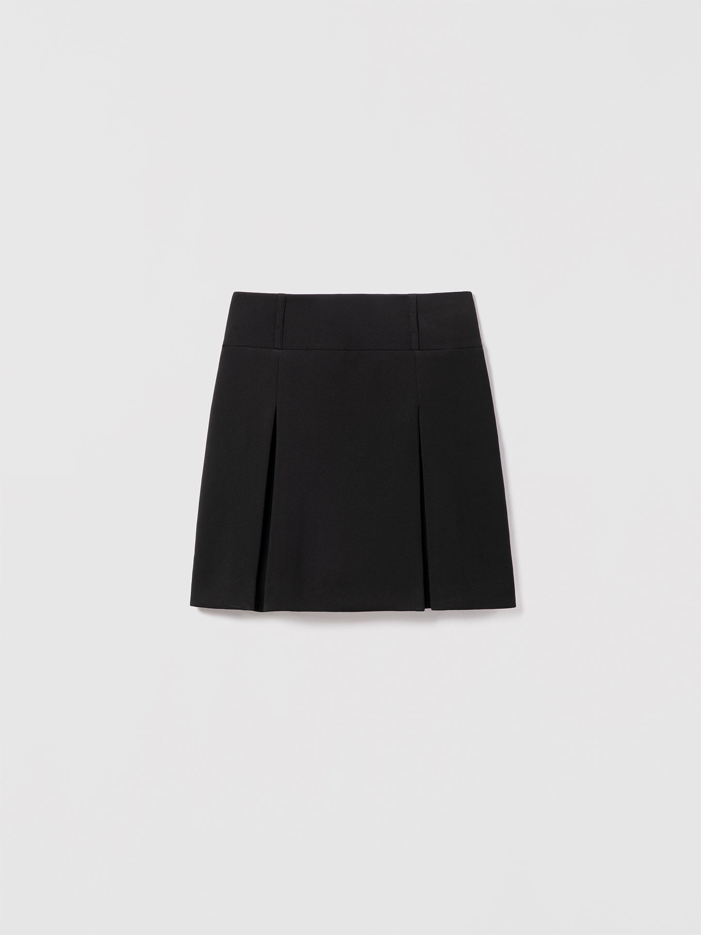 Judith and Charles Brandi Skirt – Short, black full skirt in stretch crepe with a mid-rise silhouette, featuring an invisible back zipper and belt loops, fully lined in acetate/polyester blend, Made in Canada from Japanese fabric, 19" back length (Style 600-2527).