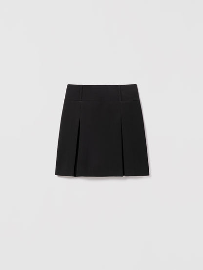 Judith and Charles Brandi Skirt – Short, black full skirt in stretch crepe with a mid-rise silhouette, featuring an invisible back zipper and belt loops, fully lined in acetate/polyester blend, Made in Canada from Japanese fabric, 19" back length (Style 600-2527).