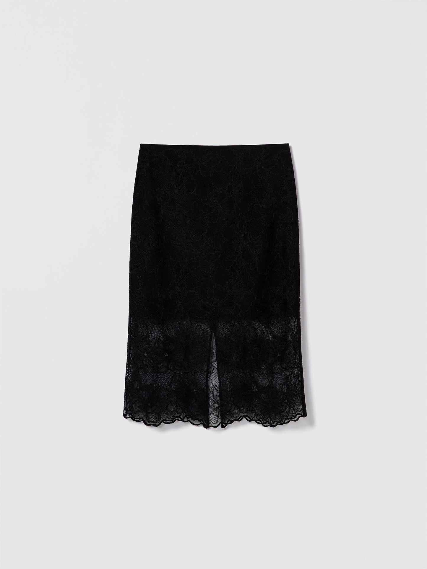 Black lace skirt by Judith & Charles featuring a scalloped hem, back slit, clean waistband, and invisible back zipper; fully lined in 100% silk.
