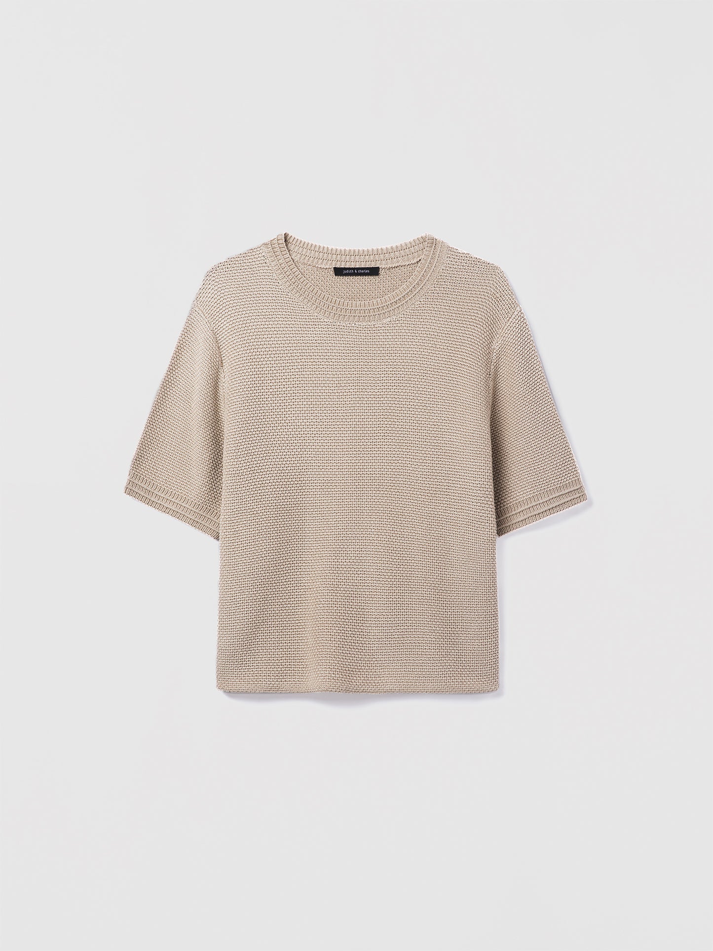 Judith and Charles sand Cedric Pullover – short-sleeve crew-neck sweater in mercerized cotton with an easy fit and 23.5″ back length; made in Italy 