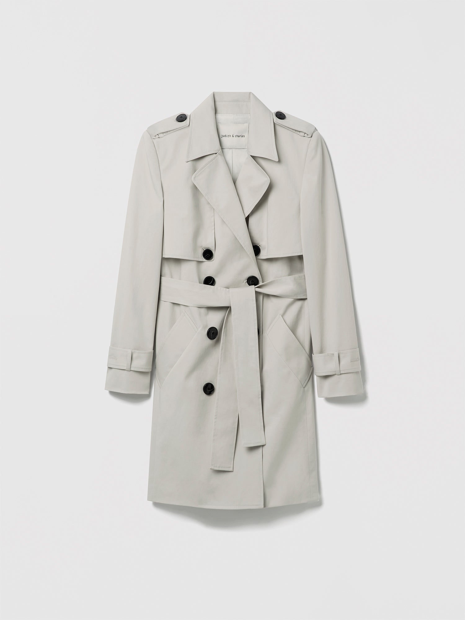 Pearl trench coat on a white background