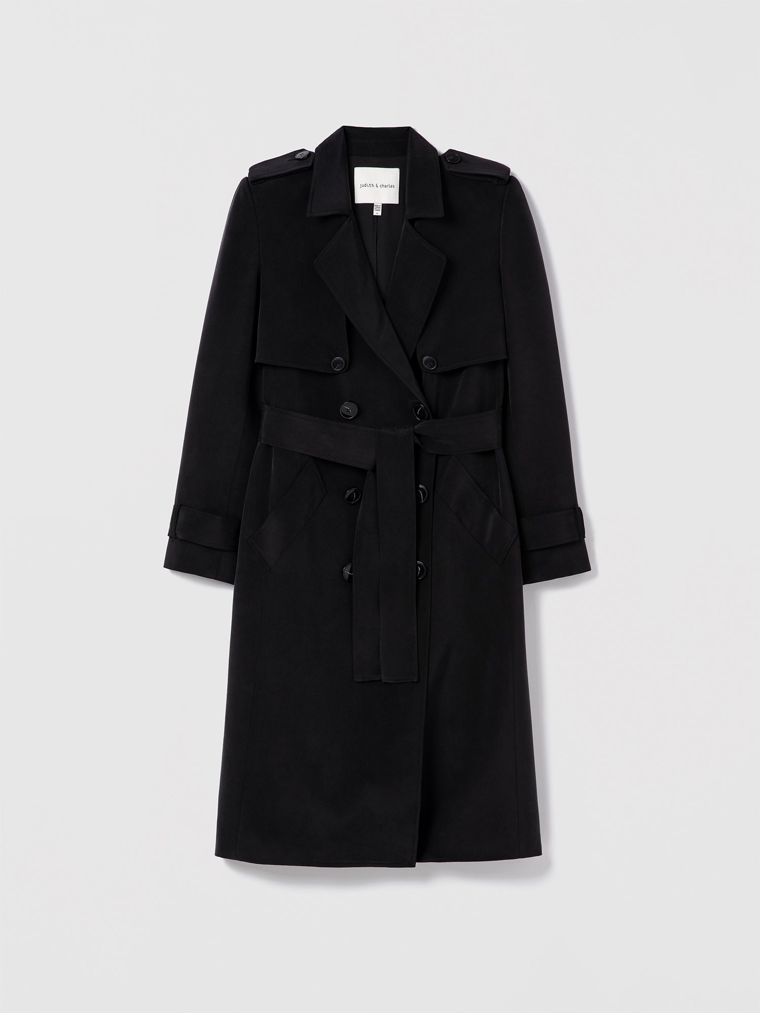 Black sandwashed silk trench coat by Judith & Charles, tailored fit with full lining.