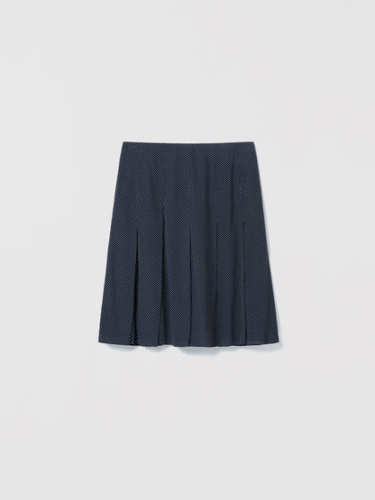 Navy pleated skirt on a light gray background