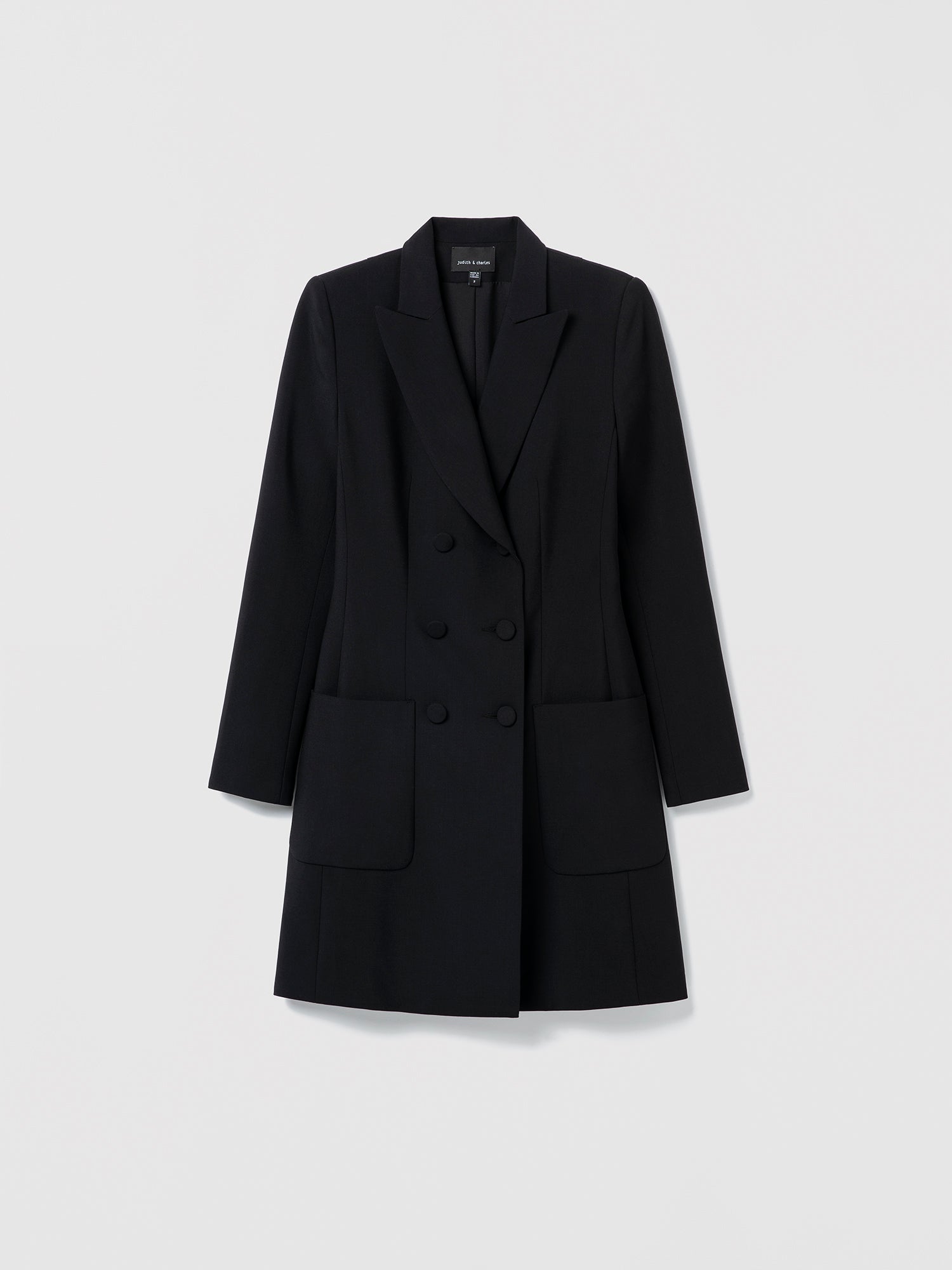 Black dress blazer on a light gray background