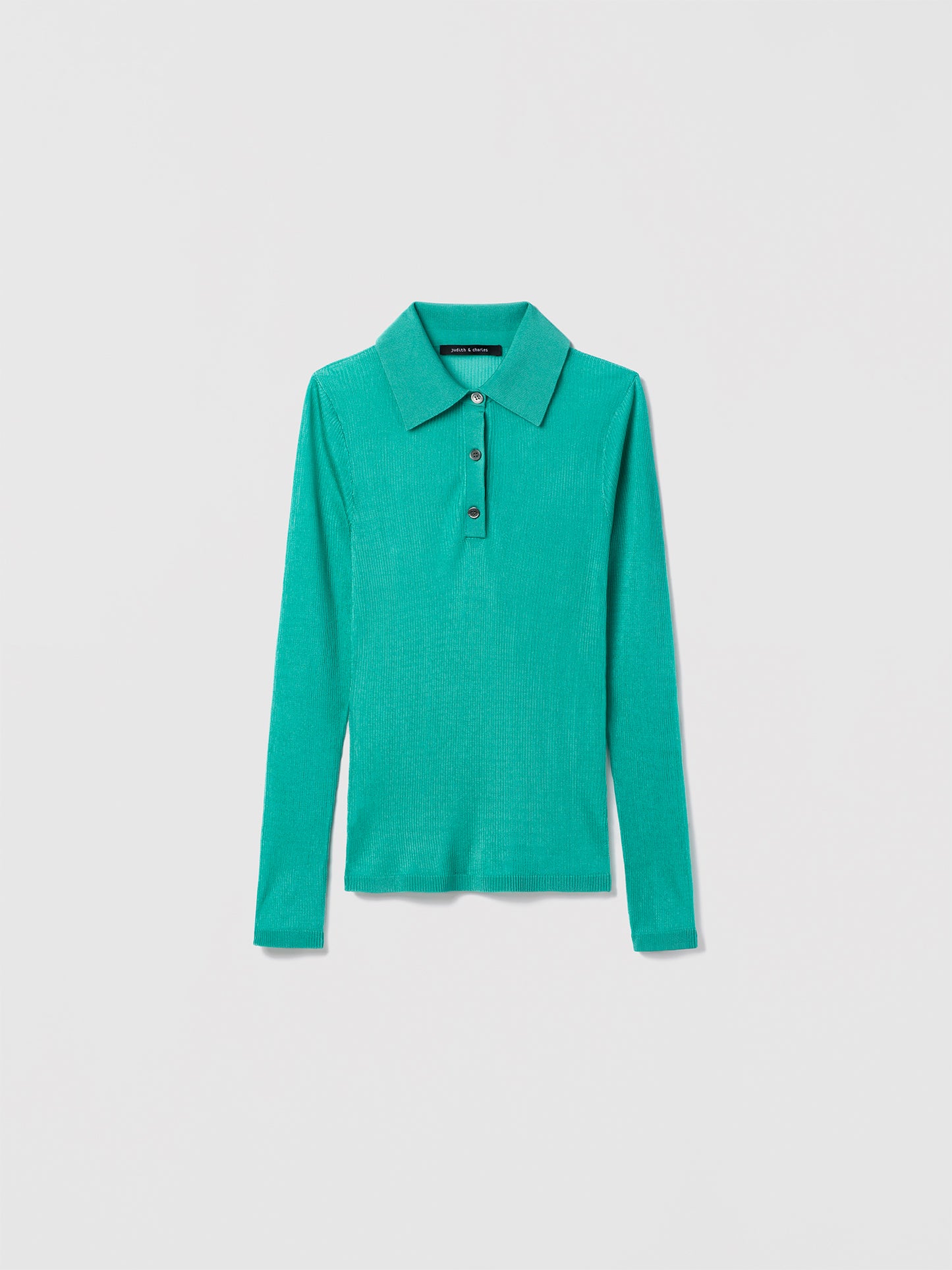 Judith and Charles Edem Polo – Long sleeve polo in fine sheer knit with polo collar and 1/2 placket button closure, crafted in 100% recycled viscose.