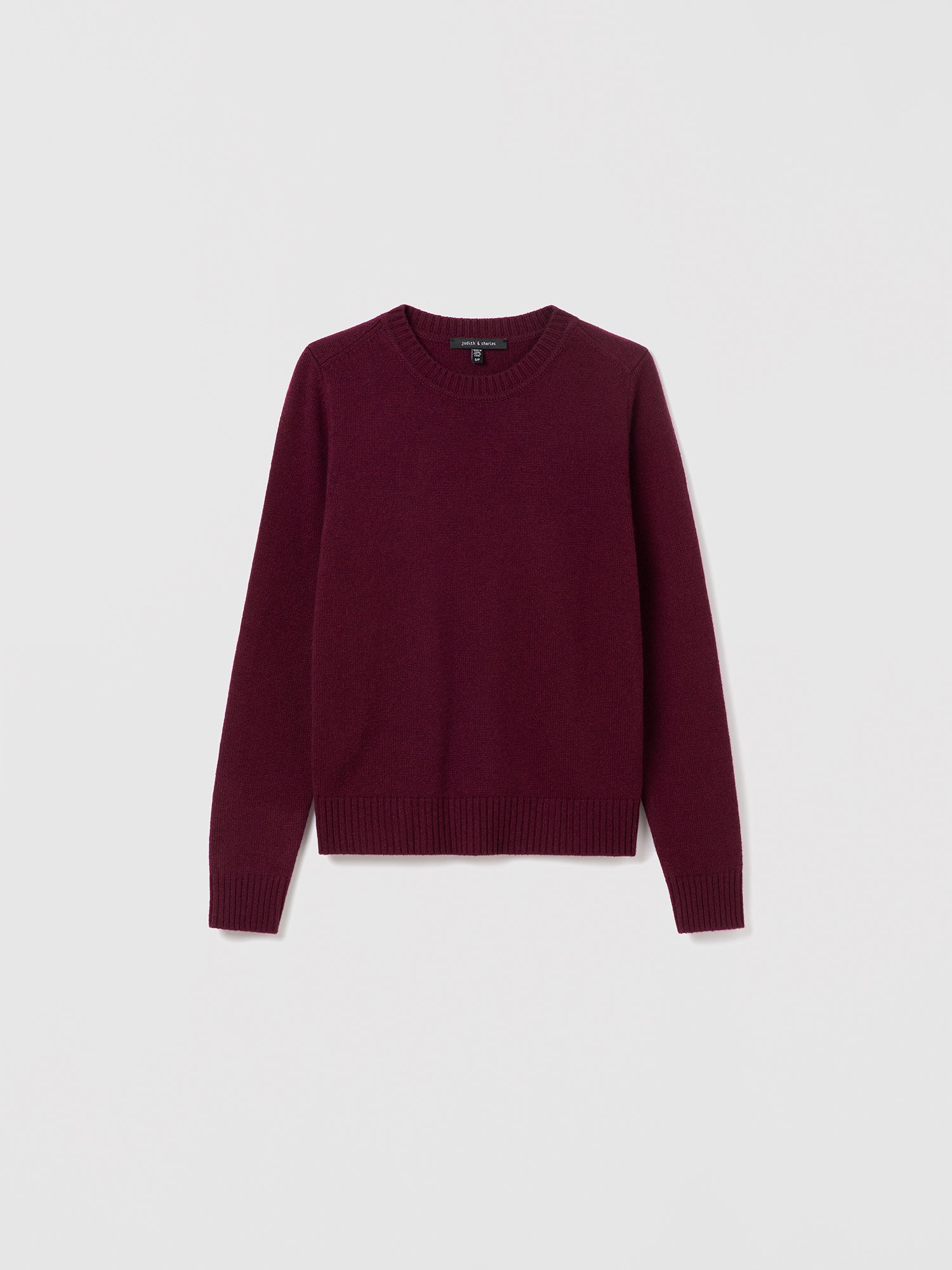  Judith & Charles dark cherry 100% cashmere crewneck sweater with straight fit and smooth finish.