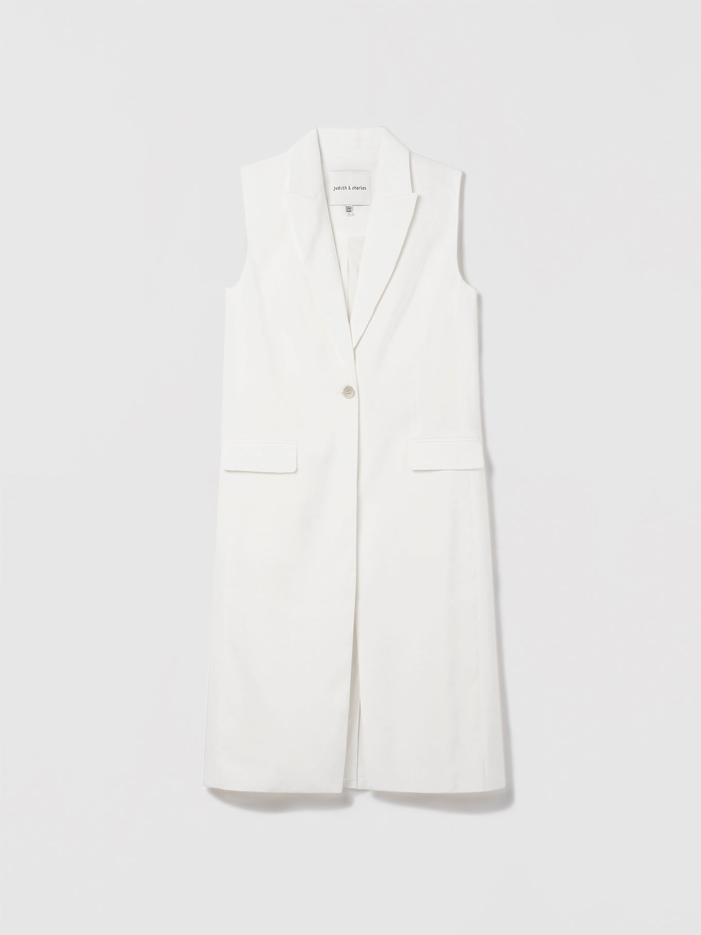 Judith and Charles  Ella Jacket – long one-button vest with peak lapel, flap pockets, double back vent; fully lined; made in Portugal from Italian fabric 
