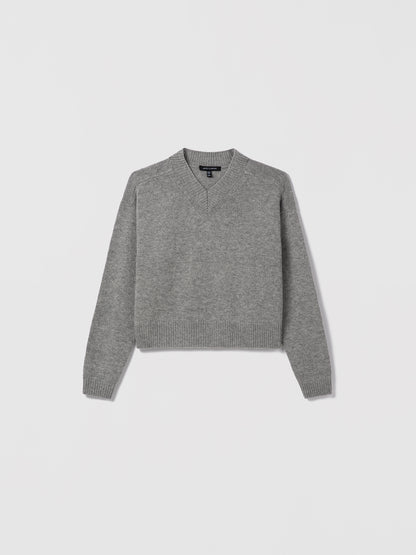 Light grey mélange wool-cashmere high V-neck sweater by Judith & Charles.
