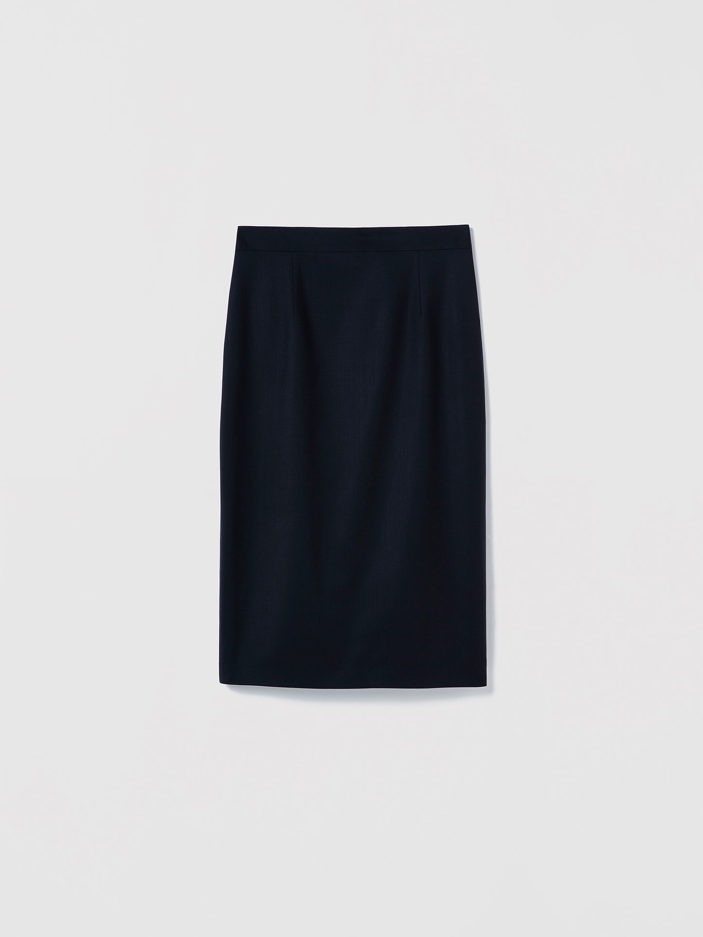 Navy pencil skirt on a light gray background
