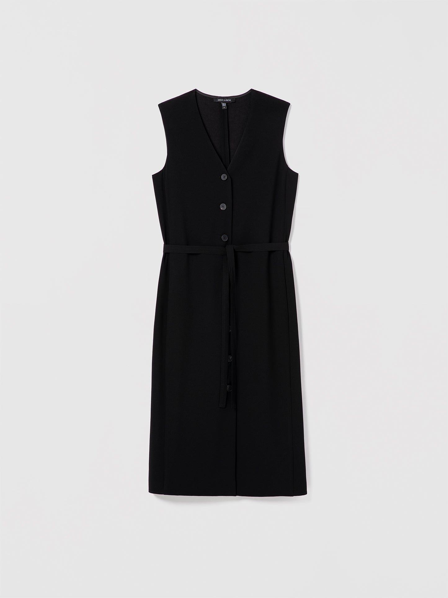 Judith and Charles Grace Dress – sleeveless black button-down midi dress with a sash tie at the waist for a cinched silhouette 