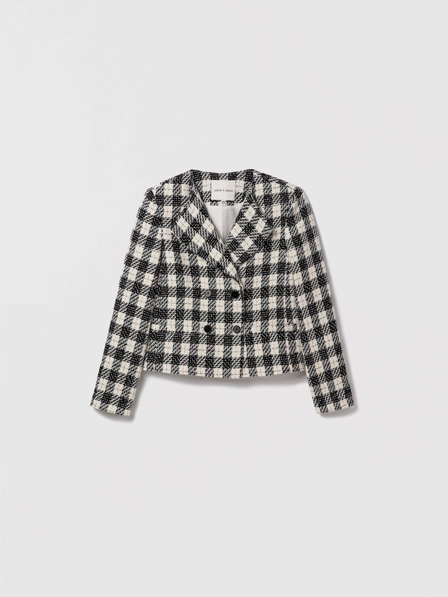 Black-and-white cropped check double-breasted jacket by Judith & Charles.