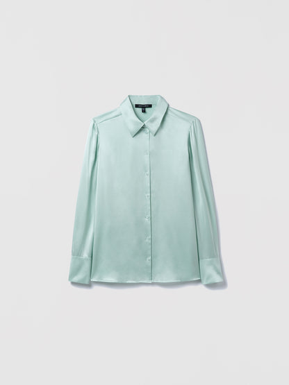 Light sage blouse on a white background