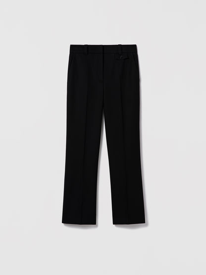 Black tailored wool pant by Judith & Charles, featuring slash pockets, back welt pockets, and a zip fly with hook-and-eye closure.