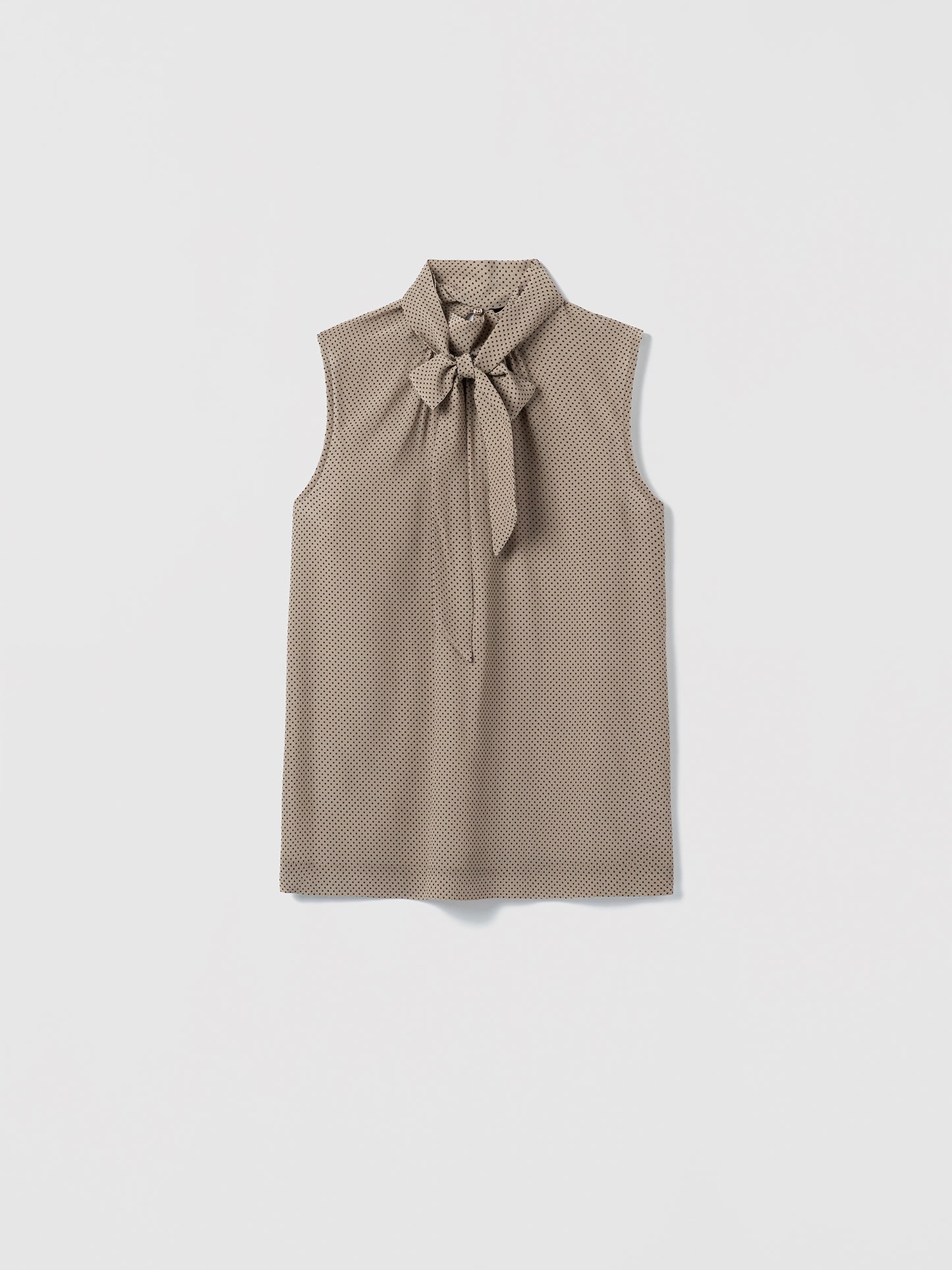 Camel sleeveless top with a removable bow detail on a white background