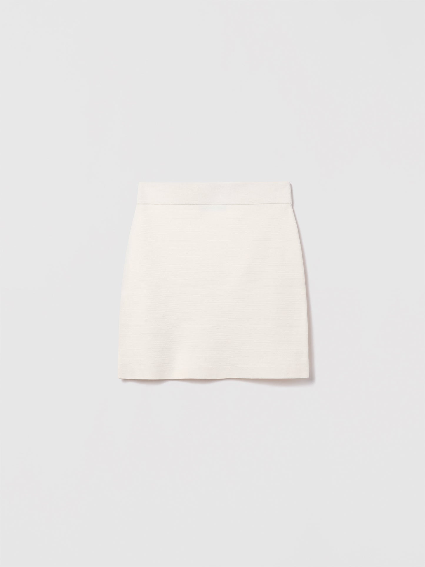 Judith & Charles A-line cotton skirt in mercerized finish with pull-on waist, shown in a clean, minimalist silhouette.