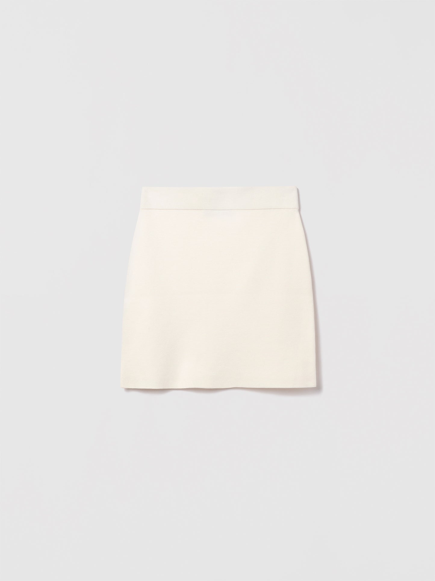 Judith and Charles Off-White Laric Skirt – Slight A-line pull-on skirt in 100% mercerized cotton, crafted from Italian fabric, 17.5" back length 