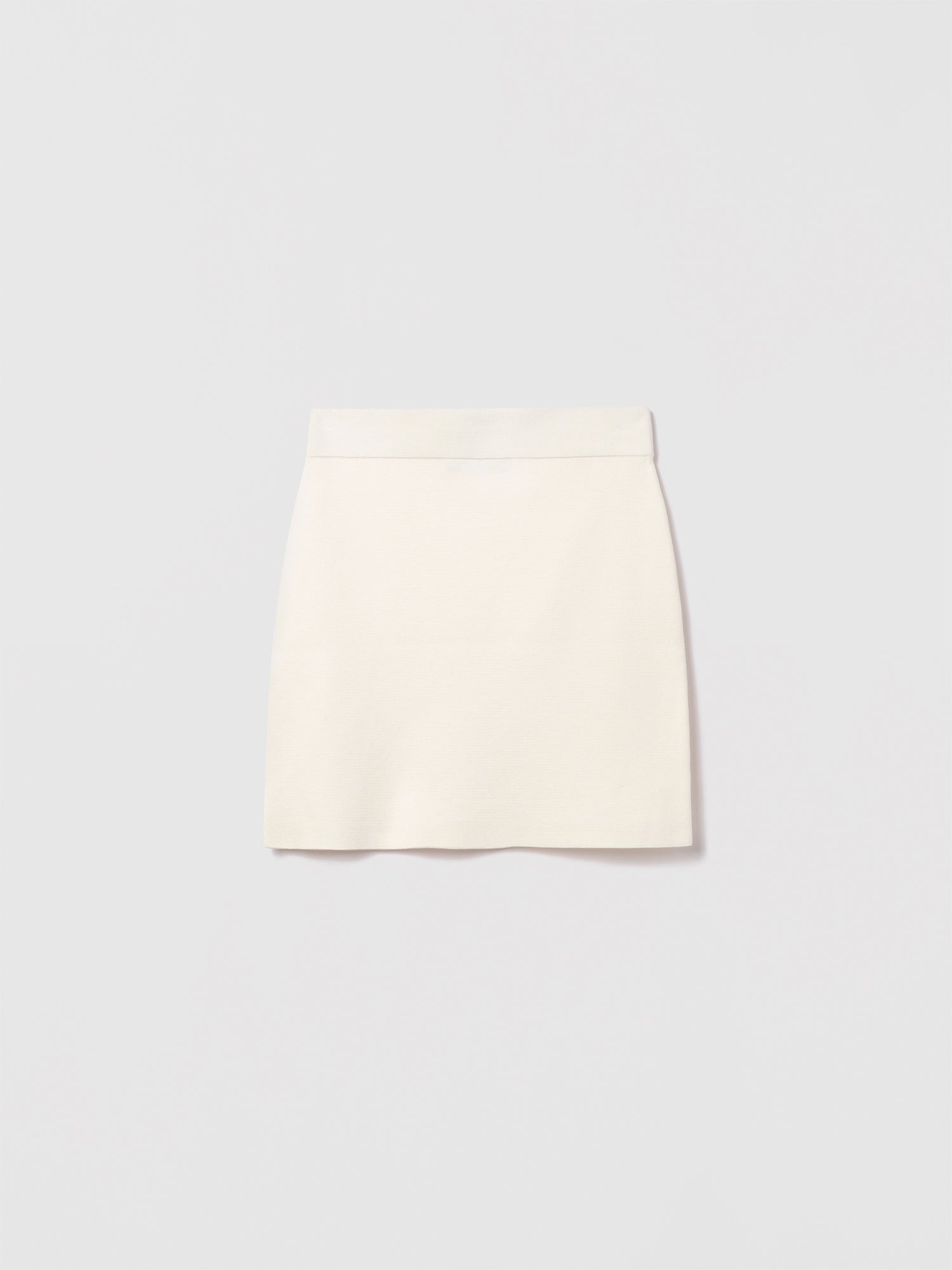 Judith and Charles Off-White Laric Skirt – Slight A-line pull-on skirt in 100% mercerized cotton, crafted from Italian fabric, 17.5" back length 