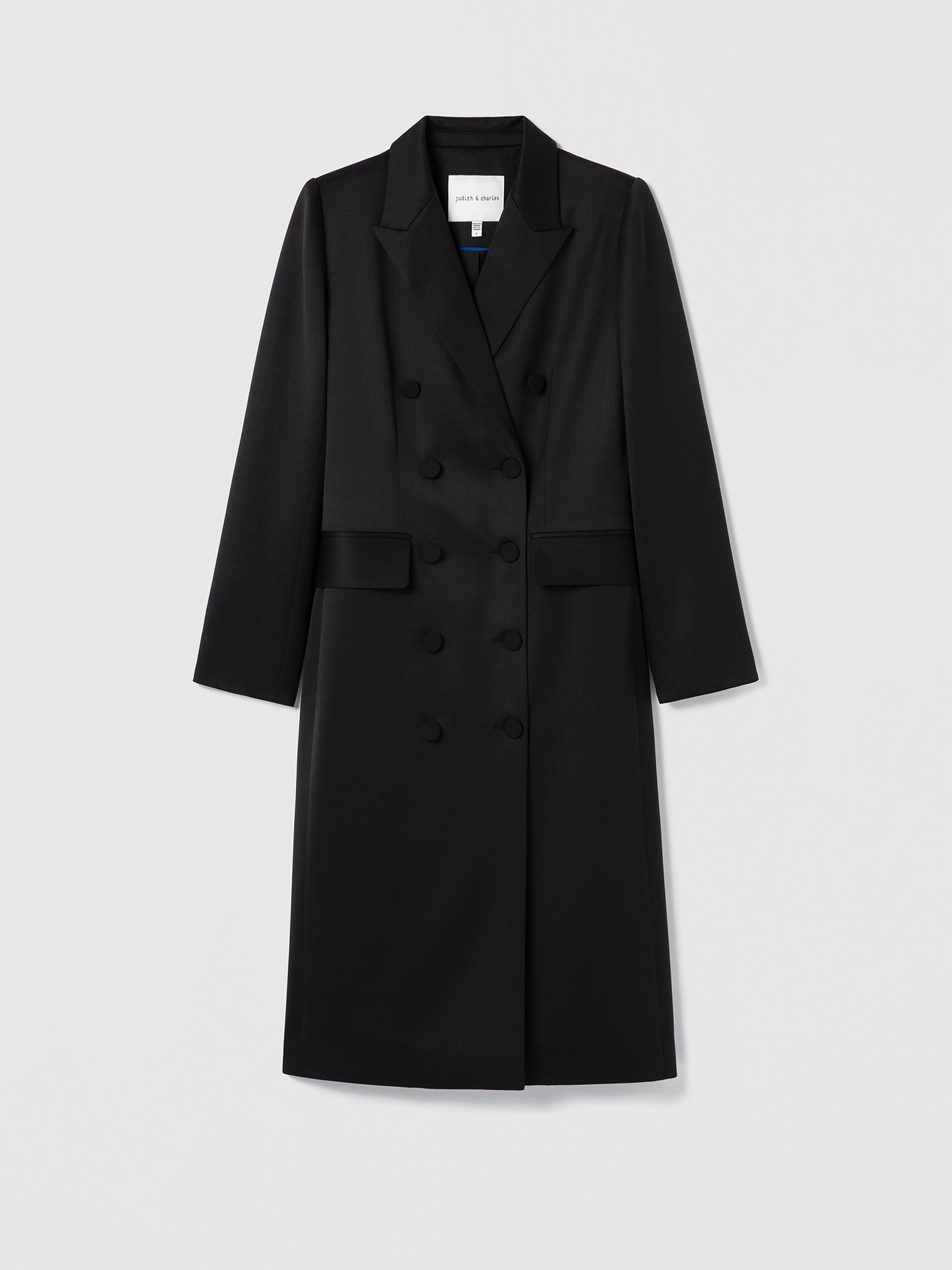 Flat of Black belted double breasted dress coat on a light gray background