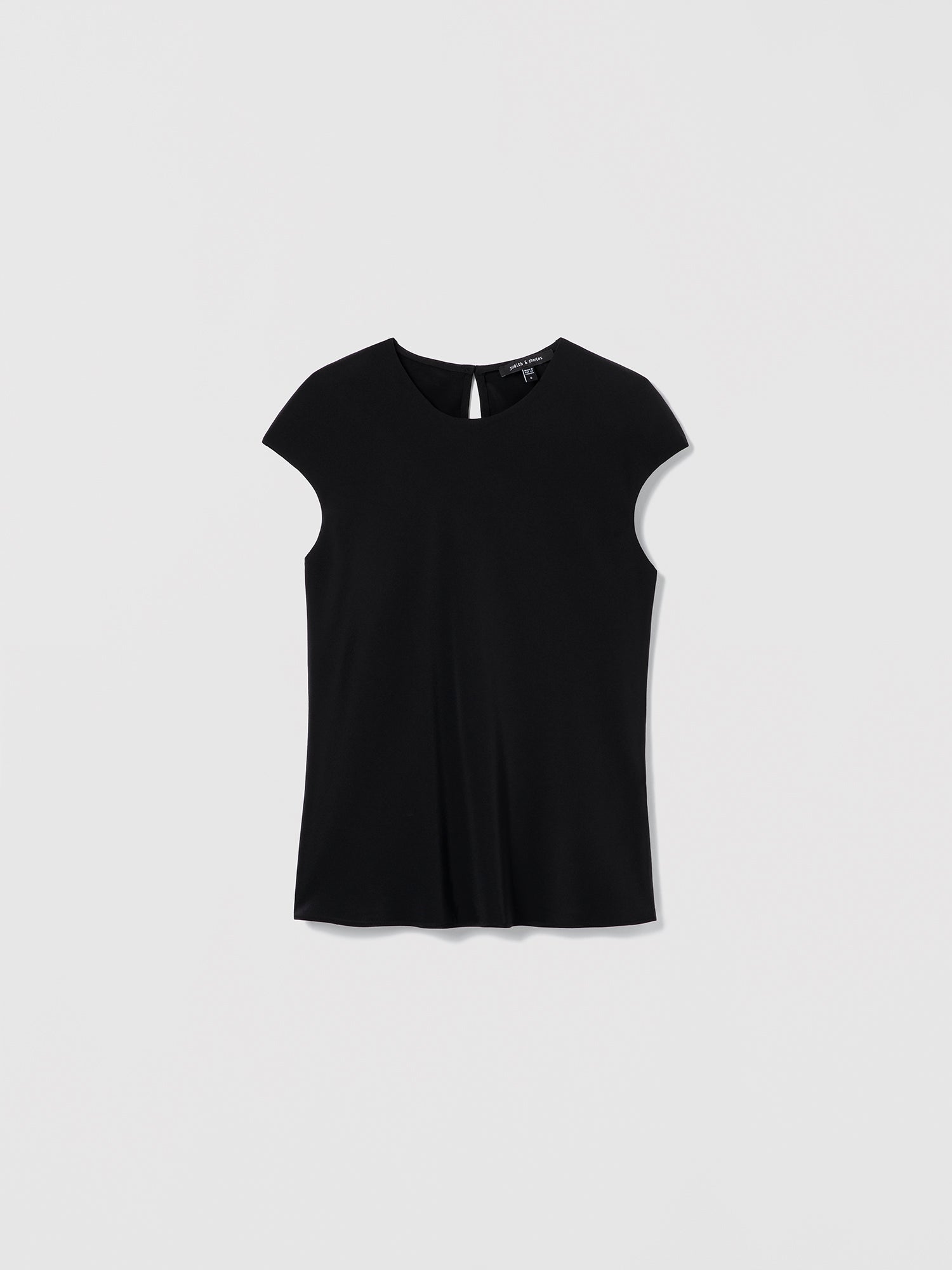 Judith & Charles black silk crew neck top — double-layer front, bias cut, back keyhole with button.