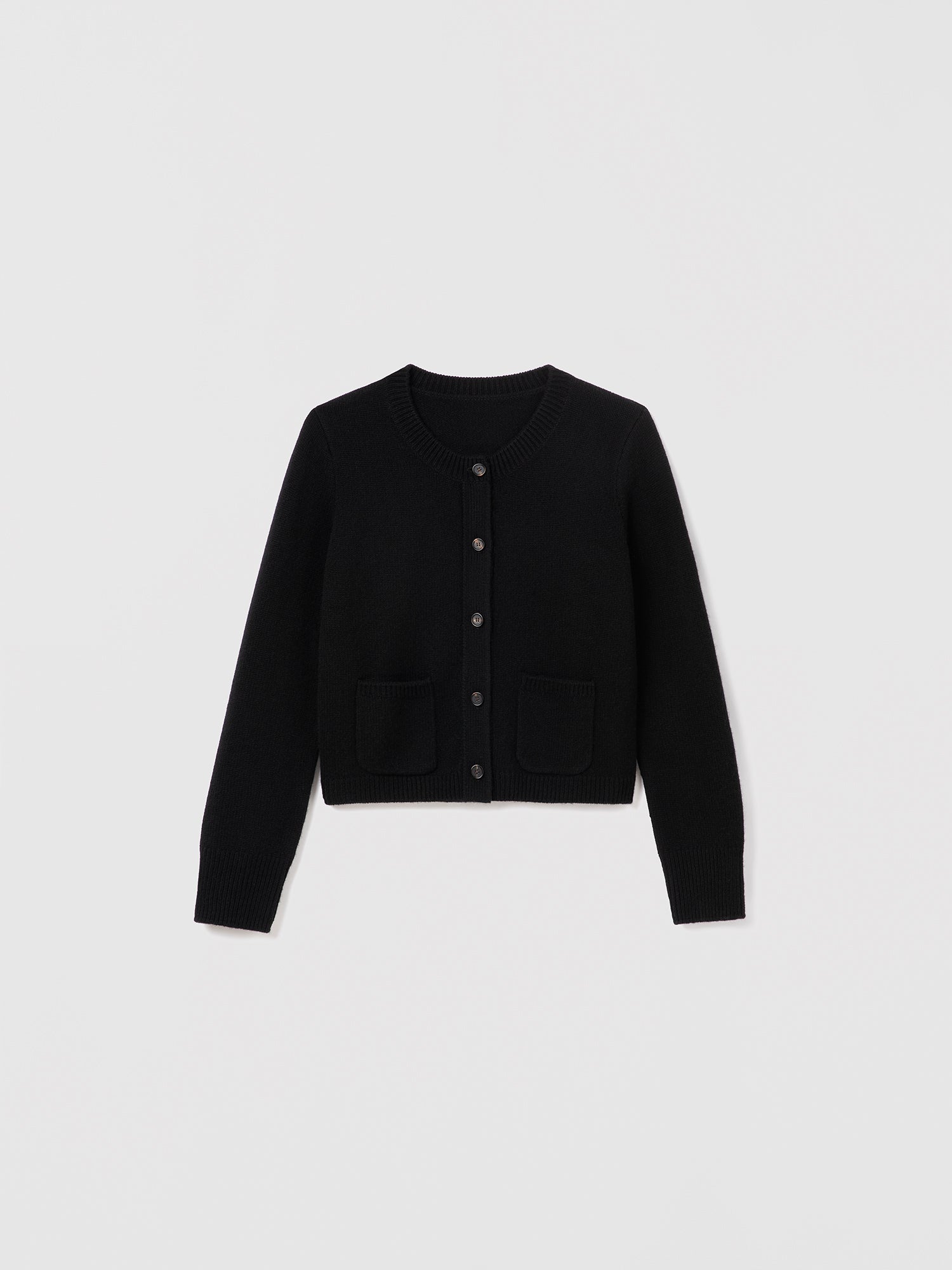Black wool-cashmere blend cardigan with crew neck, button front, and two patch pockets by Judith & Charles.